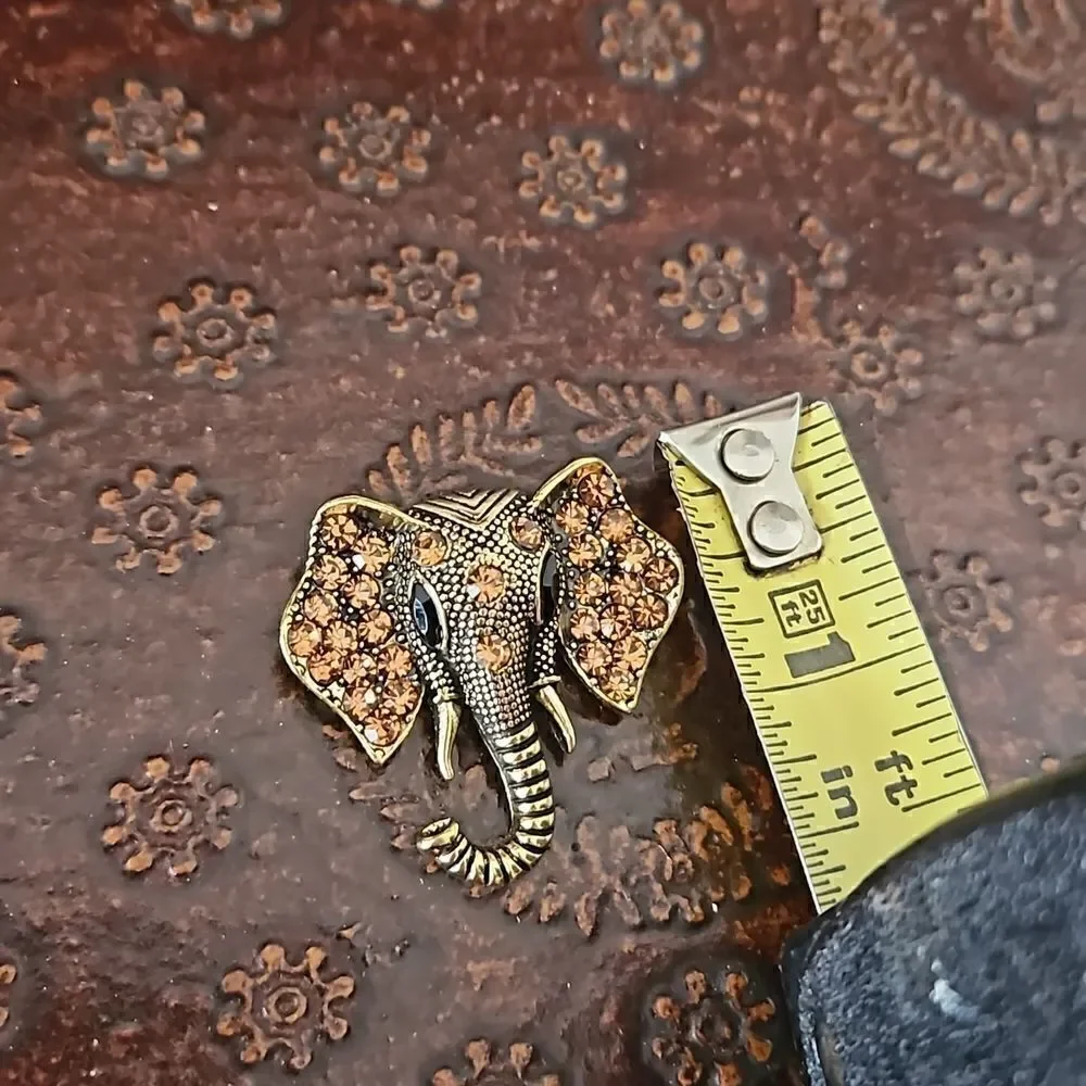 NWOT Gold tone crystal elephant brooch.